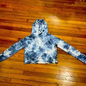 A blue and white cropped hoodie